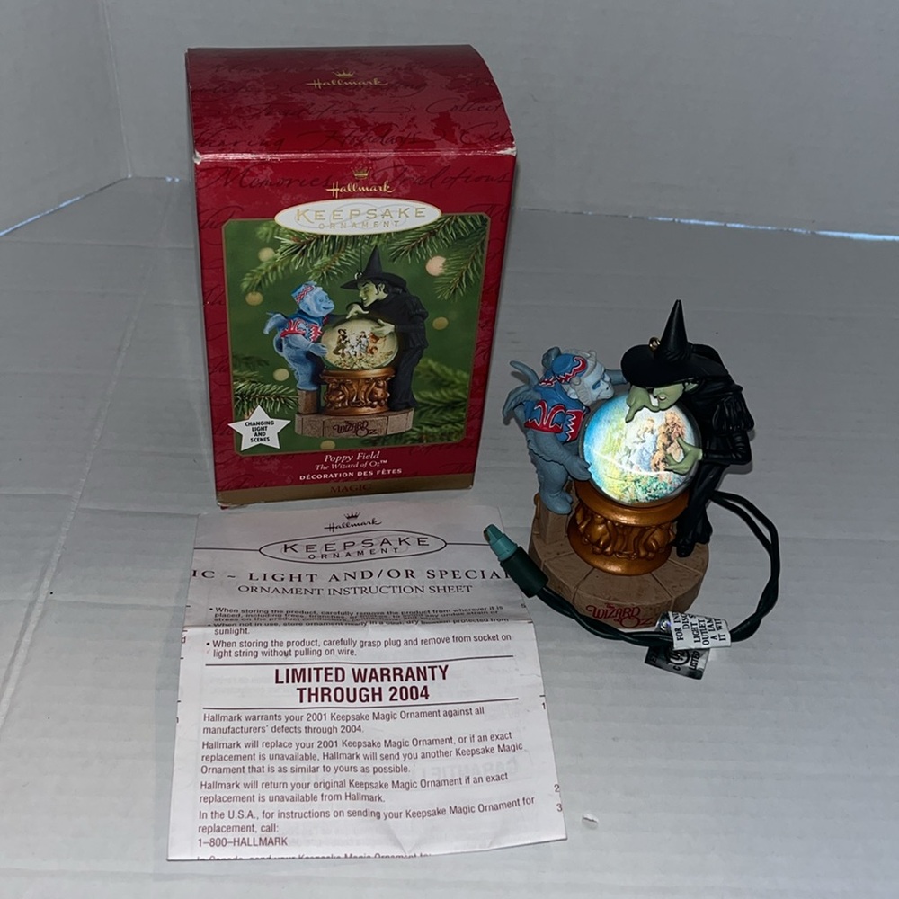 Vtg-hallmark keepsake ornament-Poppy field, the Wizard of Oz  magic ornament.